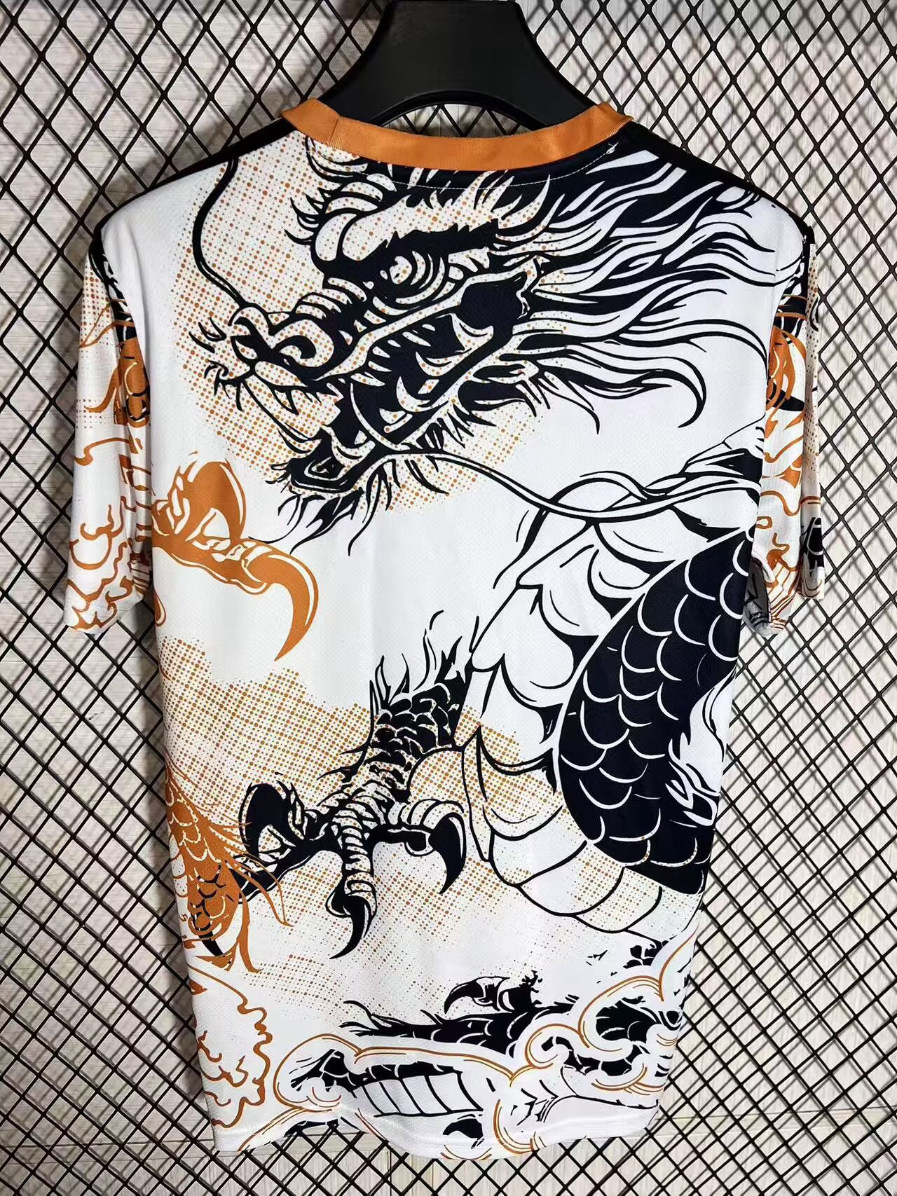 2025-26 Real Madrid Special Edition Black and Orange Dragon Jersey - Fan Edition