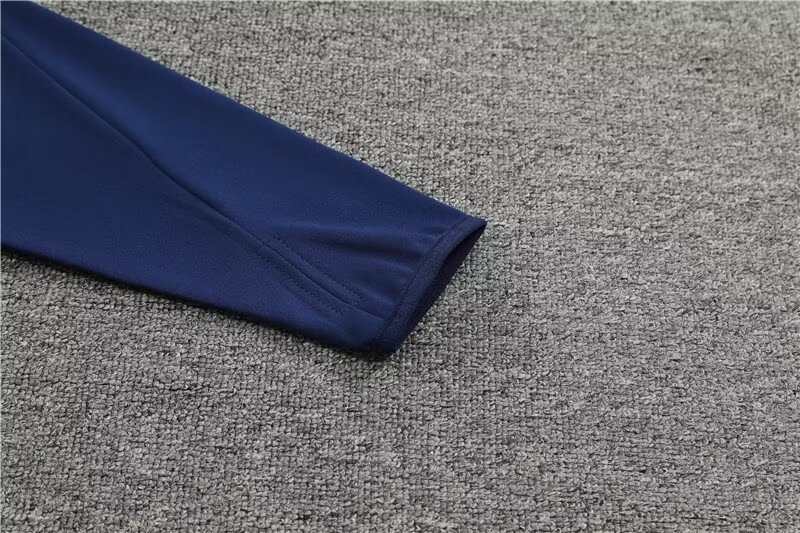 2024/25 Arsenal half zip training suit