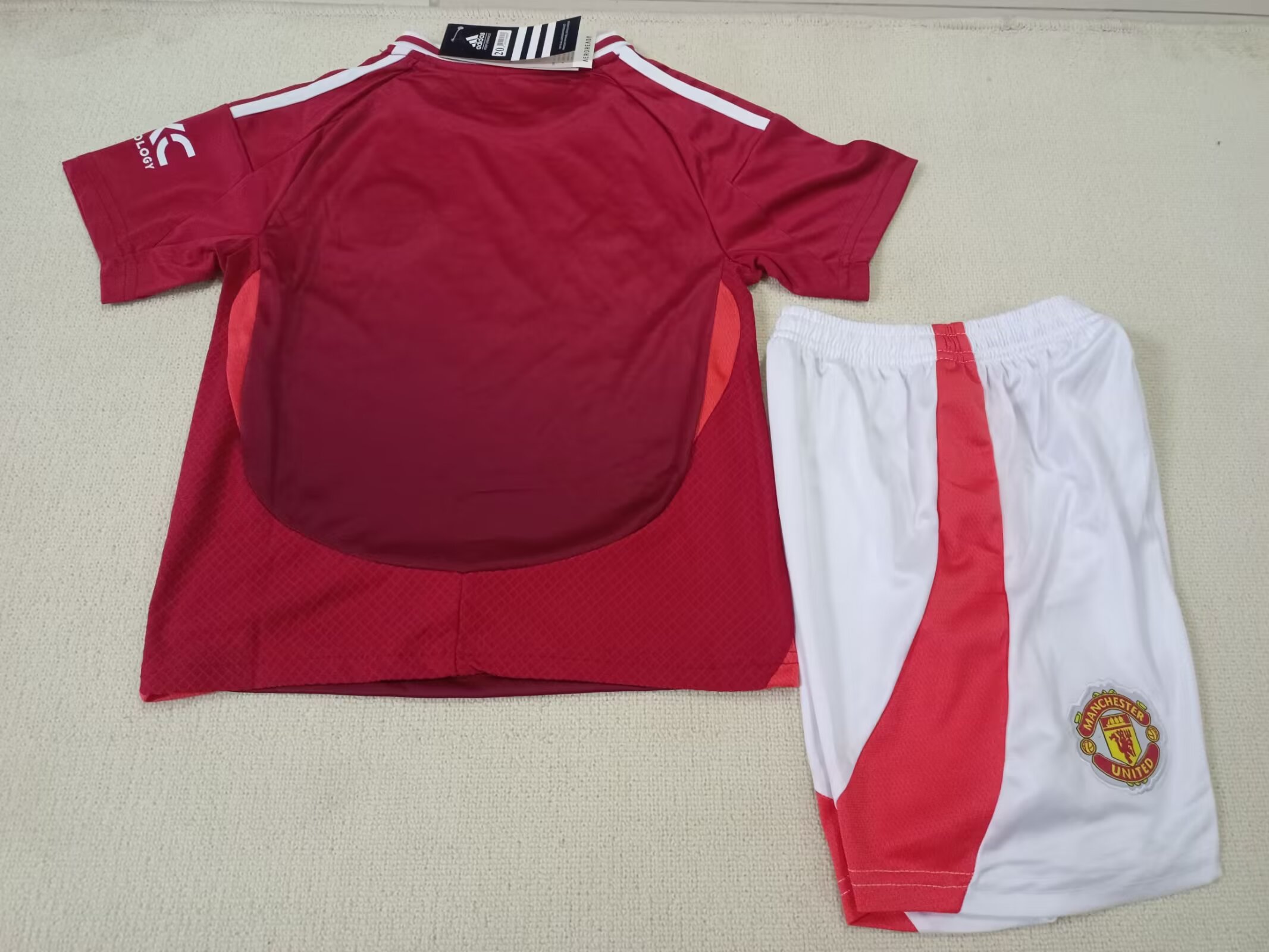 2024/25 Manchester United Home Shirt. --- Kids Kit