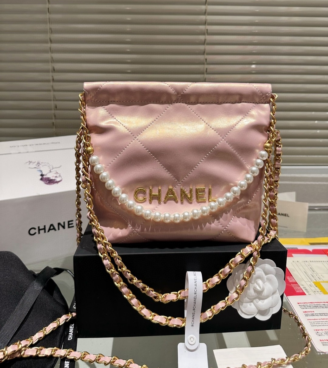 Chanel 22 Drawstring pearl chain crossbody bag